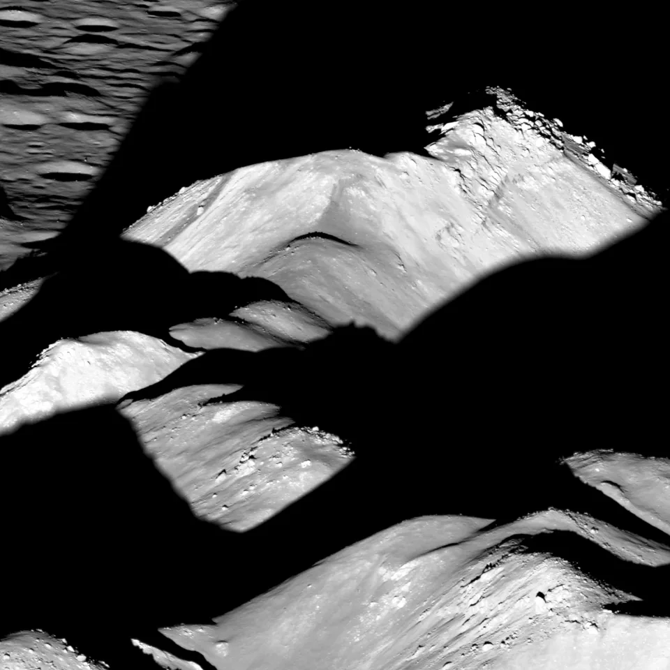 Reading lunar terrain and materials: the central peaks of Copernicus
